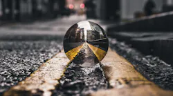 selective-focus-photo-of-lensball-on-asphalt-road-2251798