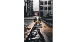 selective-focus-photo-of-lensball-on-asphalt-road-2251798