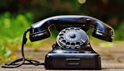 selective-focus-photography-of-black-rotary-phone-163007