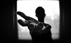 man-s-hand-in-shallow-focus-and-grayscale-photography-167964