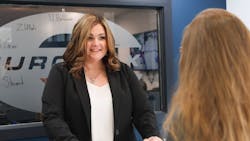 Anje Johnson of EuroFix talks to a customer. Anje Johnson of EuroFix talks to a customer.