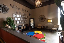 Warm earthy tones spell out the children's play area at Babcock Auto Care. Warm earthy tones spell out the children's play area at Babcock Auto Care.