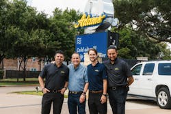 Perry Adams and son, Joe, with members of the shop team. Perry Adams and son, Joe, with members of the shop team.