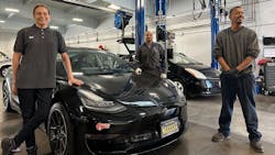 A decade of development: Earthling technicians Cara, Jeo, and Leon with a Tesla Model 3 and a Gen 2 Prius. A decade of development: Earthling technicians Cara, Jeo, and Leon with a Tesla Model 3 and a Gen 2 Prius.