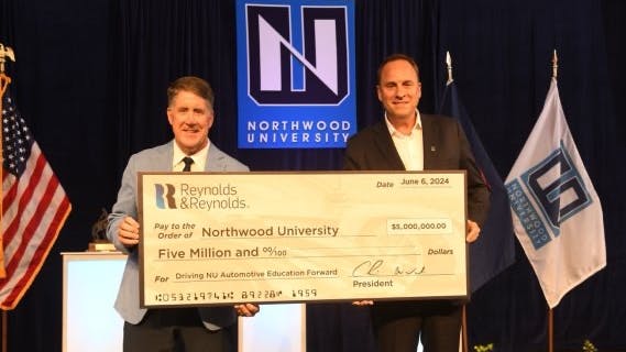 Pictured from left: Northwood University President Kent MacDonald and Chris Walsh, president of Reynolds and Reynolds, at the President&rsquo;s Freedom Celebration Thursday, June 6, 2024, at Northwood University in Midland, Michigan.