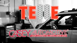 a black and white photo of a car in an auto shop with the logos for Telle Tire and Casey's Automotive overlaid a black and white photo of a car in an auto shop with the logos for Telle Tire and Casey's Automotive overlaid