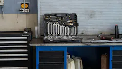 a tool case sits open on a work bench