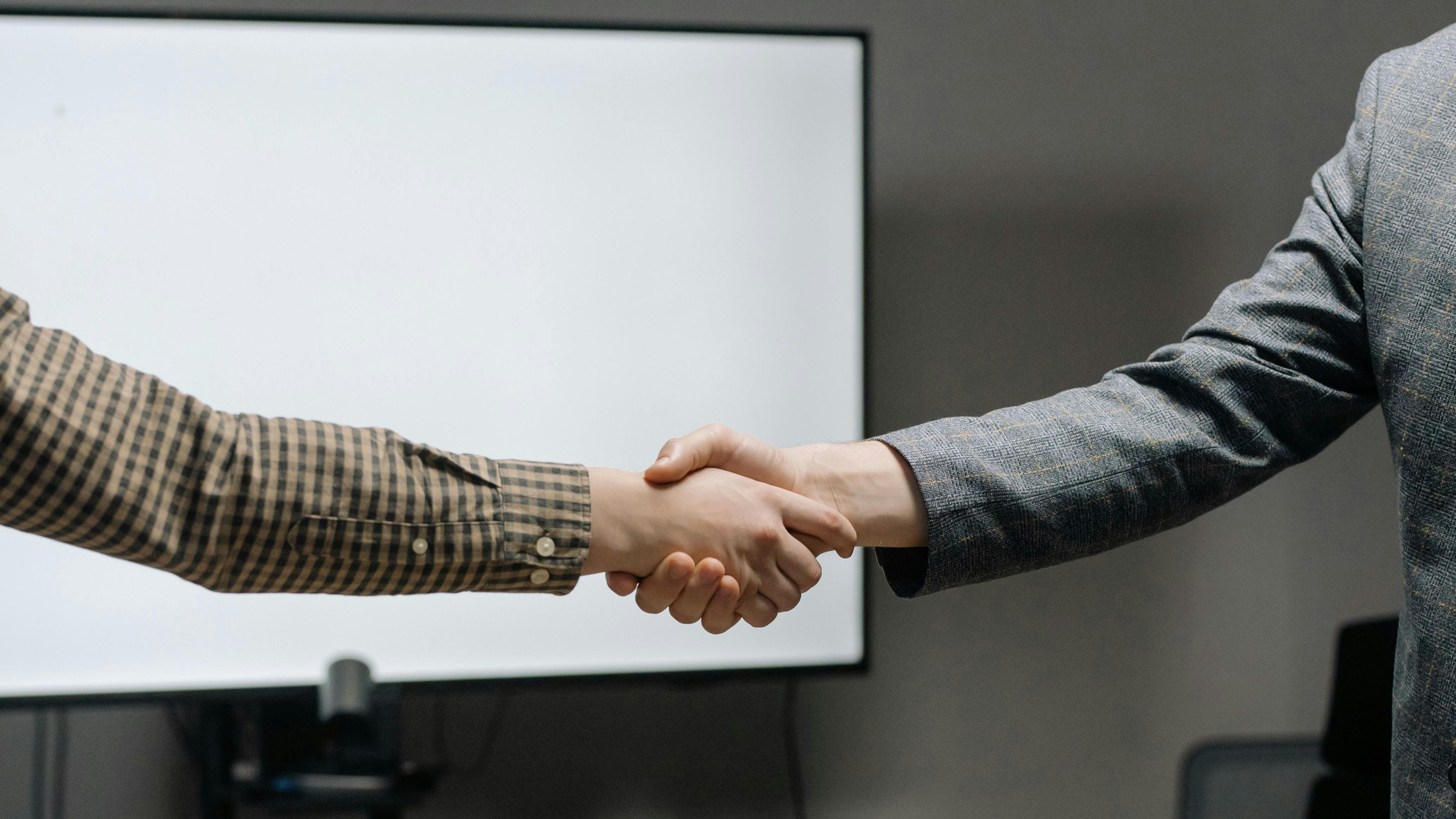two people shaking hands