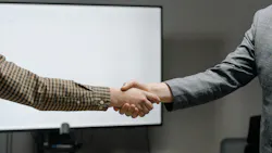 two people shaking hands