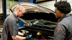 Techs working together